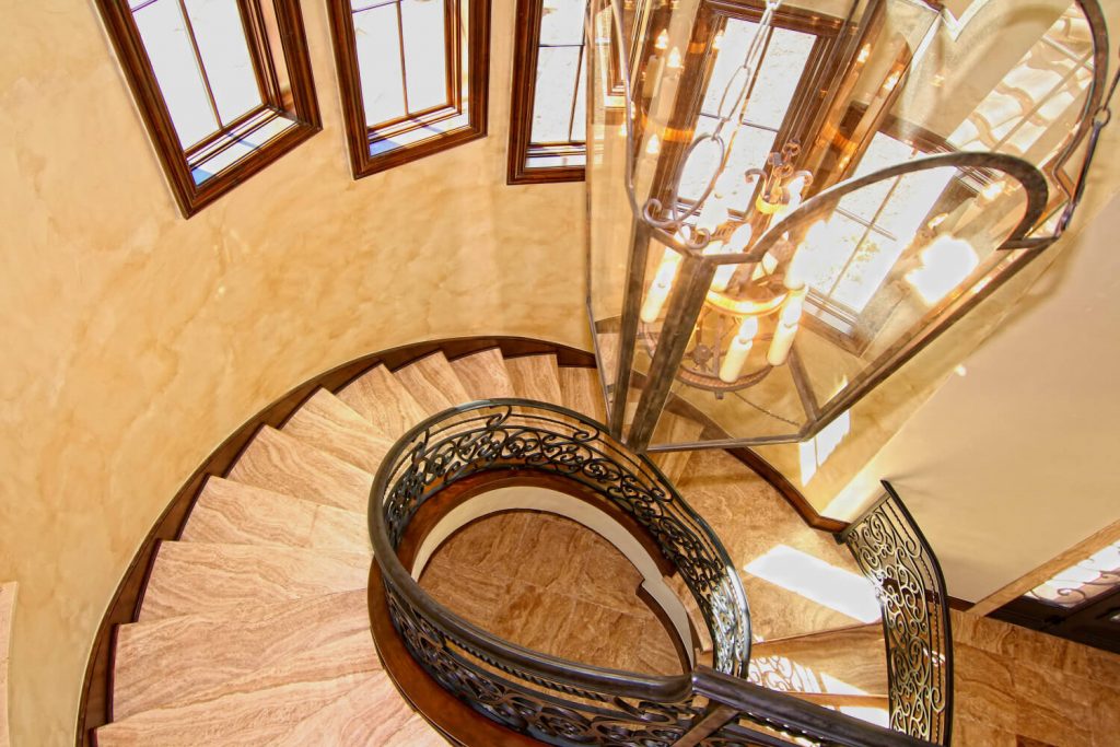 Home of Distinction Austin Showcase Spiral Stairway by Zbranek and Holt Custom Homes Luxury Home Builders Austin 1
